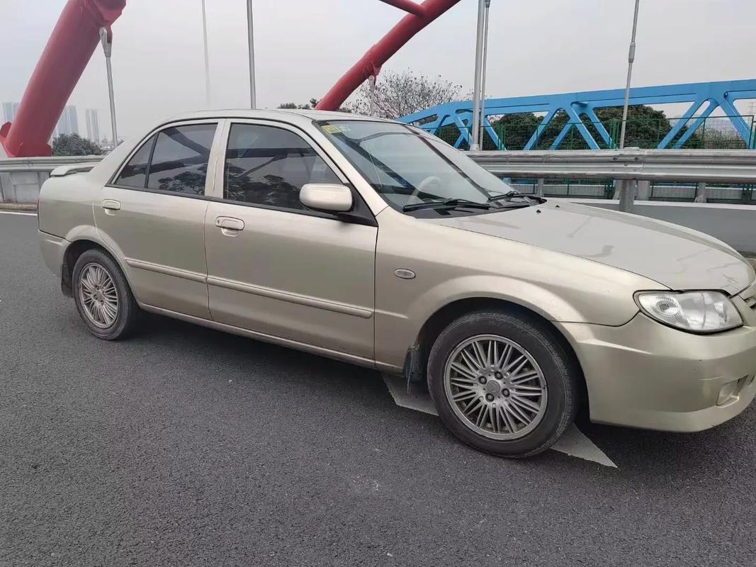 【老款马自达323,老款马自达323自重多少吨】